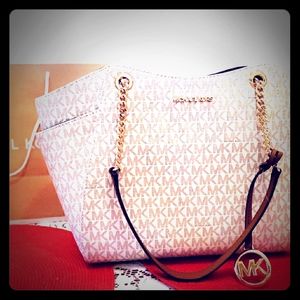 Brand new Micheal Kors Jet Set Travel Leather